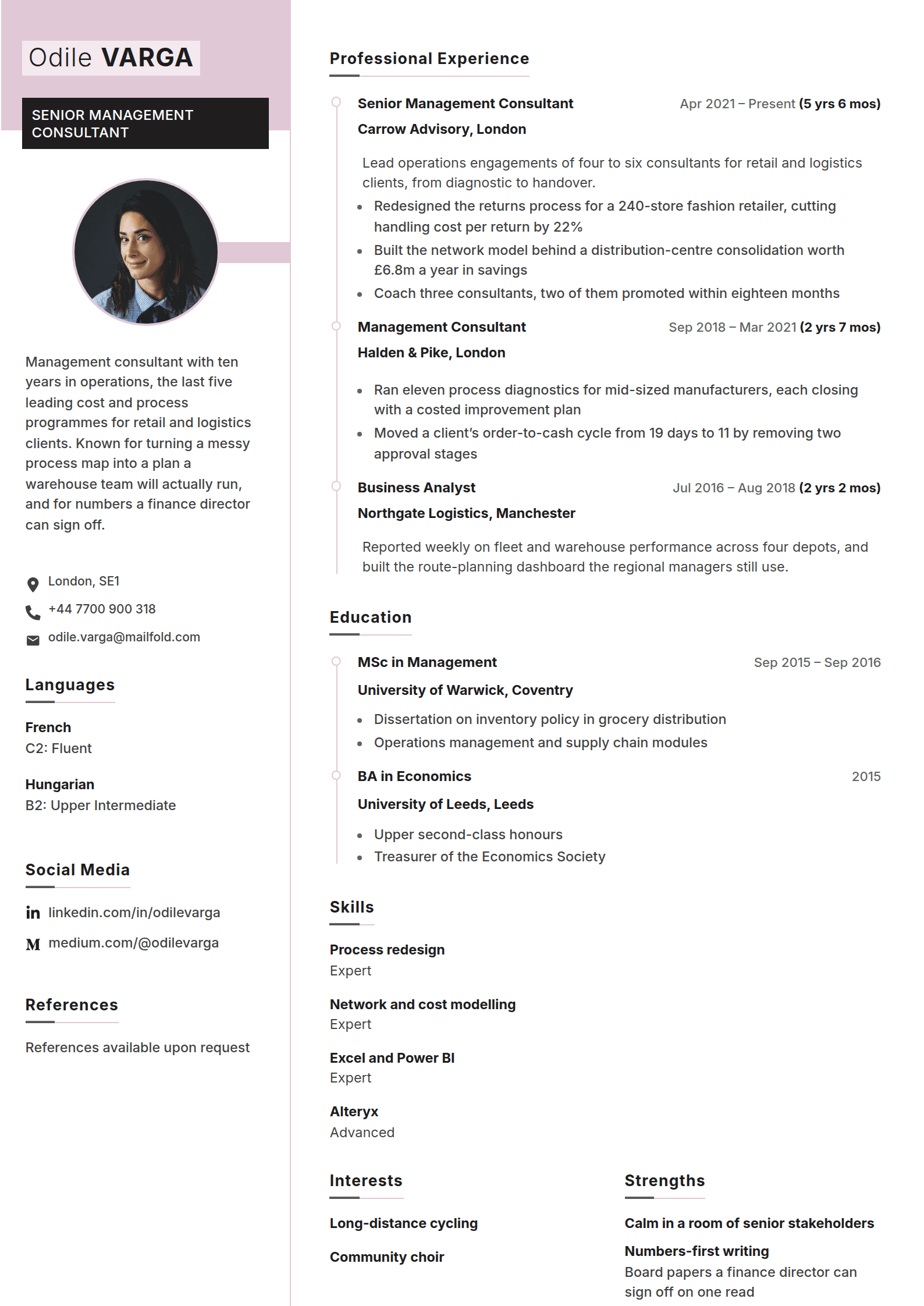 Mallow resume template: A white page with a pink name block over a black title bar, a round photo tied to the column rule and the history on a pink rail